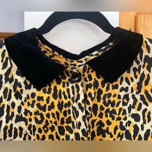 Vintage Leopard print housecoat with black velvet collar.